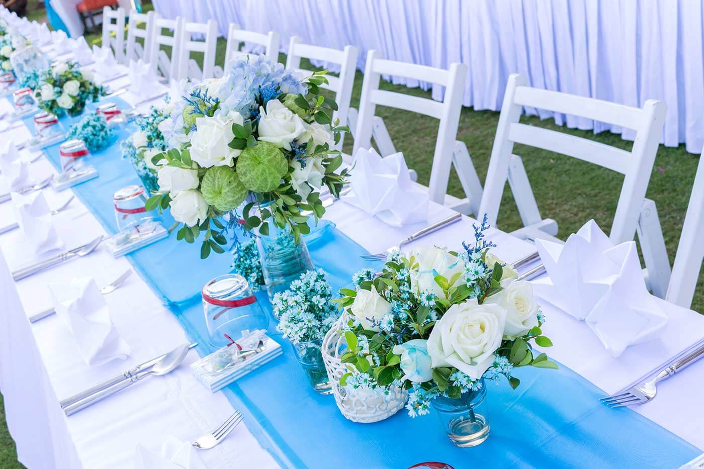 Tischdeko zur Hochzeit in Türkis oder Blau